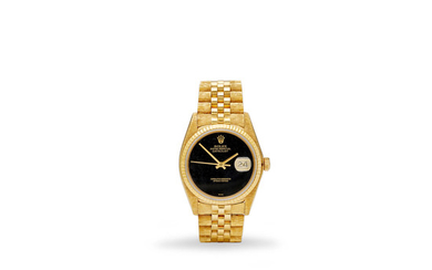 Rolex. A fine 18K gold automatic calendar bracelet watch with oxyx dial