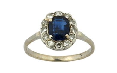 A sapphire and diamond cluster ring The cut-cornered...