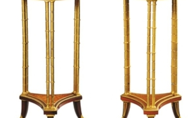 Two French gilt-bronze and mahogany guéridons, Paris, late 19th century, after a model by Adam Weisweiler, one signed Henry Dasson