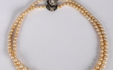 A two-row pearl necklace, the rows of graduated pearls