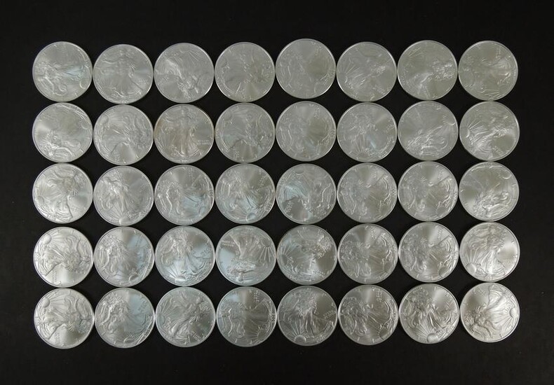 (40) American Silver Eagle Dollars.