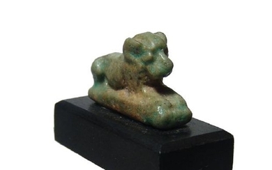 Egyptian faience glazed amulet of a recumbent lion