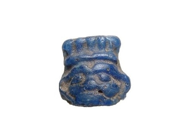 Wonderful Egyptian blue glass amulet of the head of Bes