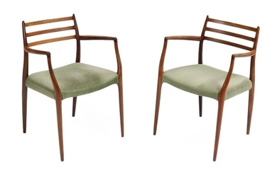 Niels O. Møller: A pair of Brazilian rosewood armchairs, upholstered in seats with green velour. Manufactured by J. L. Møller. (2)