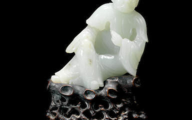A pale green jade figure of a monk