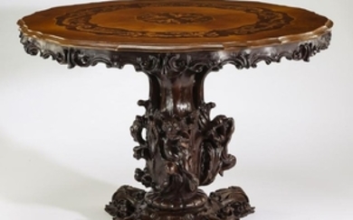 Italian carved and marquetry inlaid center table