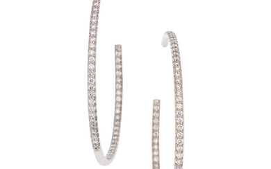 Diamond, White Gold Earrings The inside-out hoop earrings featuring...
