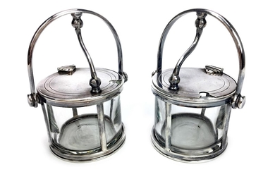 A PAIR OF GLASS MUSTARD POTS WITH MOUNTS BY