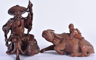A 19TH CENTURY CHINESE CARVED HARDWOOD FISHERMAN Qing, together with a similar buffalo. Largest 16 c