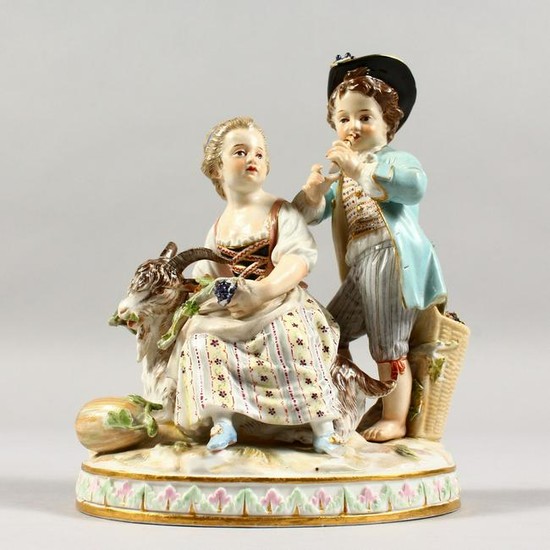 A 19TH CENTURY MEISSEN PORCELAIN GROUP OF A BOY AND