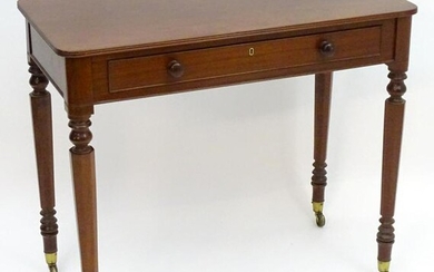 A 19thC mahogany chamber table in the manner of Gillows