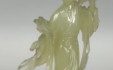 A 20TH CENTURY CHINESE JADEITE FIGURE OF A GUANYIN...
