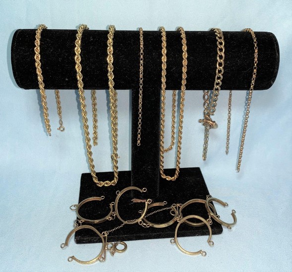 A 9 carat gold coin bracelet mount; various neck chains mark...