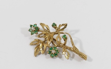 A 9 carat gold emerald and diamond set floral spray brooch, ...