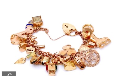 A 9ct rose gold curb link bracelet terminating in padlock fa...