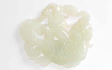 A CHINESE PALE CELADON JADE CARVING OF A BOY RIDING A DRAGON-CARP QING DYNASTY (1644-1912), CIRCA 19TH CENTURY