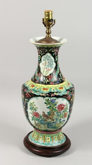 A CHINESE PORCELAIN LAMP with panels of flowers and