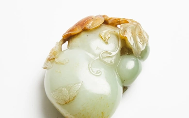 A Celadon and Russet Jade Carving of a Double-Gourd, 19th Century