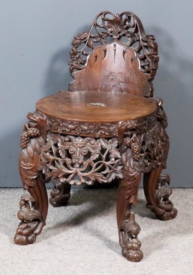 A Chinese Carved Wood Low Back Chair, the whole...