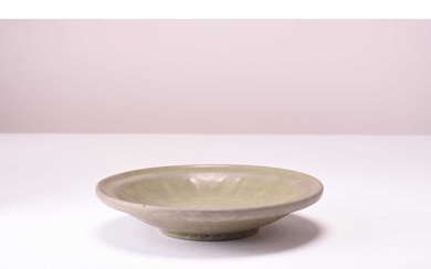 A Chinese Longquan celadon dish, Ming Dynasty Of circular fo...