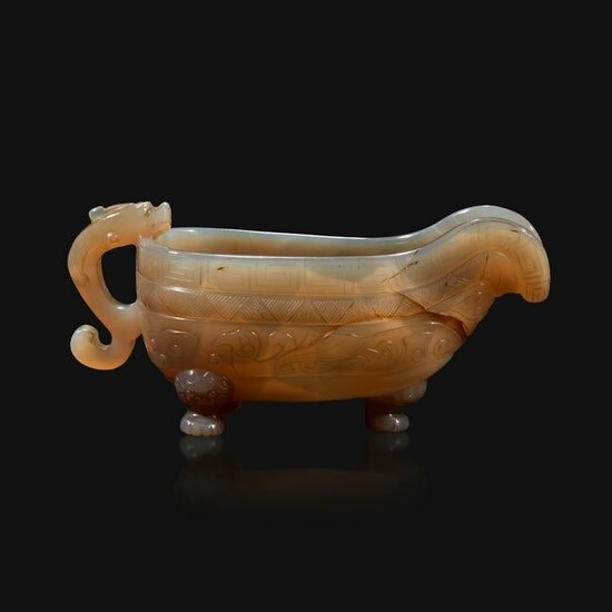 A Chinese archaistic carved agate libation cup
