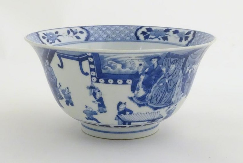 A Chinese blue and white footed bowl with a flared rim