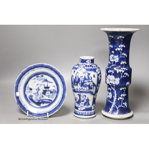 A Chinese blue and white gu vase, a baluster vase and a dish...