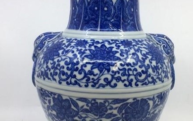 A Chinese blue and white twin-handled Zun vase together with...