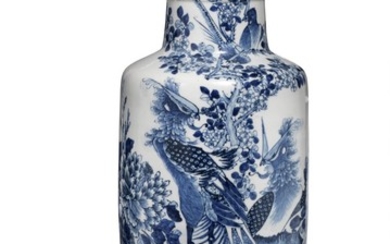 A Chinese porcelain rouleau vase in underglaze blue decorated with peacock on rock surrounded by chrysanthemums and prunus in blossom. 19th century H. 60.5 cm