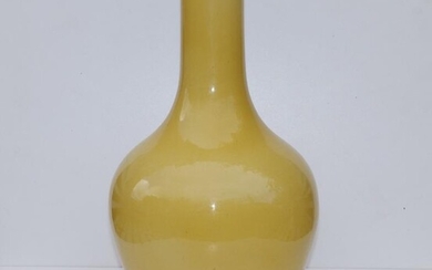 An 18thC Chinese Imperial yellow glazed porcelain bottle vase,...