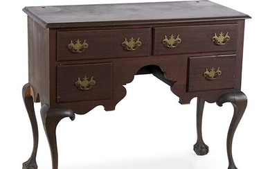 A Chippendale Style Carved Mahogany Lowboy.