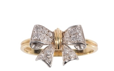 A DIAMOND BOW RING the diamond set bow, with a yellow gold t...