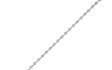 A DIAMOND LINE BRACELET comprising a trace chain set with round brilliant cut diamonds, the diamonds