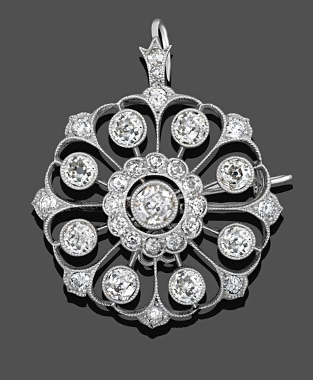 A Diamond Brooch/Pendant, circa 1910, an old cut diamond centrally within a border of smaller...