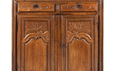 A French Provincial Carved Oak Cabinet