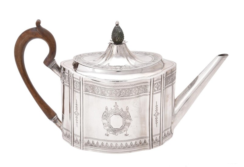 A George III Irish silver shaped oval tea pot