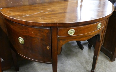 A George III style mahogany demi lune sideboard