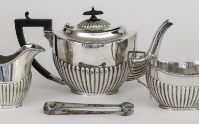 A George V Silver Three Piece Tea Service, by...