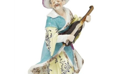 A German porcelain figure of a man...