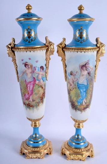 A LARGE PAIR OF ORMOLU MOUNTED SEVRES VASES. 54 cm