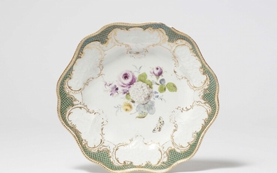 A Meissen porcelain dinner plate from the dinner service with the green mosaic border