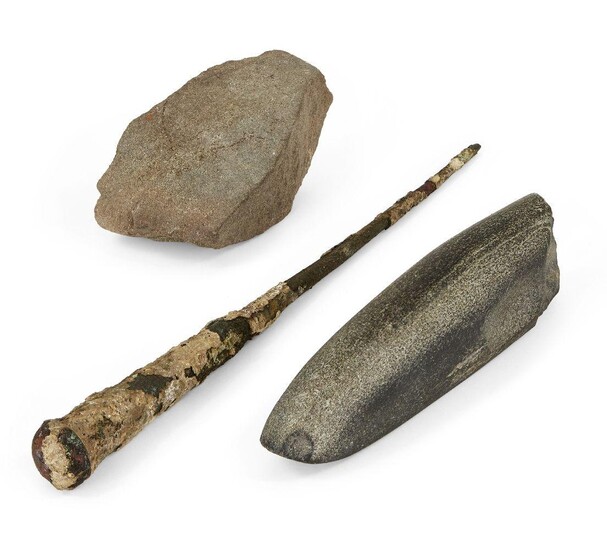 A Neolithic basalt whetstone (blade sharpener), 14.8cm; an iron nail, 26cm and a stone fragment, 11.5cm, with a label saying ‘Neolithic axe head from near Znojmo, CSSR’ (3) Provenance: Private collection formed in the 1970s