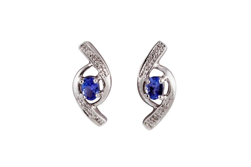 A PAIR OF DIAMOND AND TANZANITE EARRINGS, mounted in white g...
