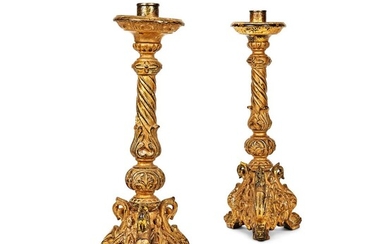 LOT WITHDRAWN - A PAIR OF EUROPEAN CARVED GILTWOOD ALTAR STICKS