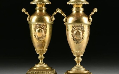 A PAIR OF VICTORIAN TWO HANDLED POLISHED BRASS VASES