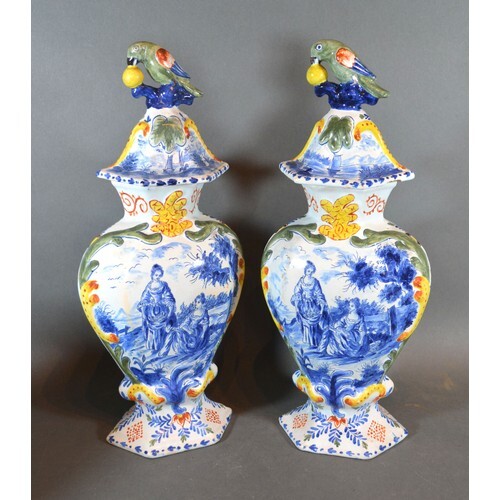 A Pair of Delft Covered Vases each with bird surmount decora...