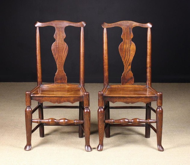 A Pair of Small Joined Elm Side Chairs, Circa 1790. The swept top rails above vase shaped back splat