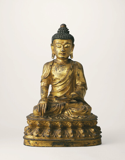 A RARE GILT-LACQUERED BRONZE FIGURE OF BUDDHA SHAKYAMUNI, INCISED TIANSHUN 6TH YEAR MARK CORRESPONDING TO 1462 AND OF THE PERIOD