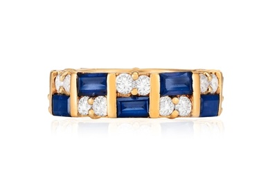 A SAPPHIRE AND DIAMOND ETERNITY RING Composed of baguette-c...