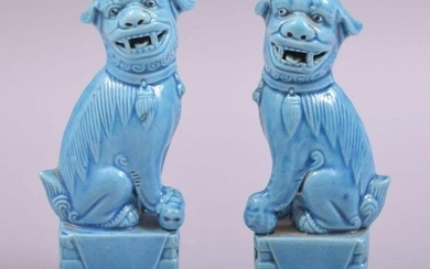 A SMALL PAIR OF CHINESE BLUE GLAZED PORCELAIN KYLIN